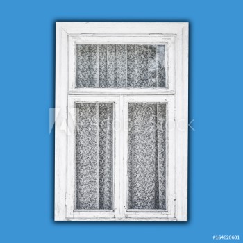 Picture of Old white paint wooden window isolated on blue